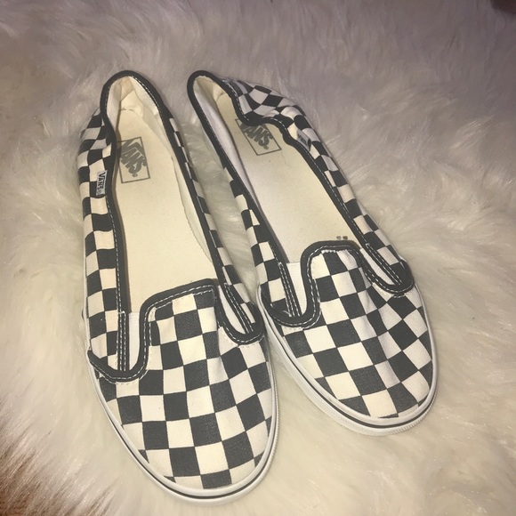 black and off white checkered vans